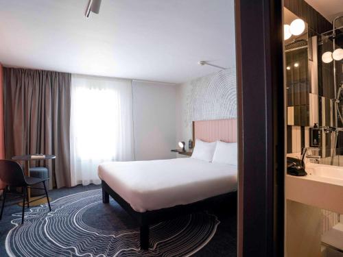 Giường trong phòng chung tại ibis Styles Paris Porte de Versailles - Mairie d'Issy