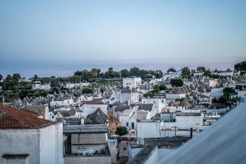 Výhľad na mesto Alberobello alebo výhľad na mesto priamo z dovolenkového domu