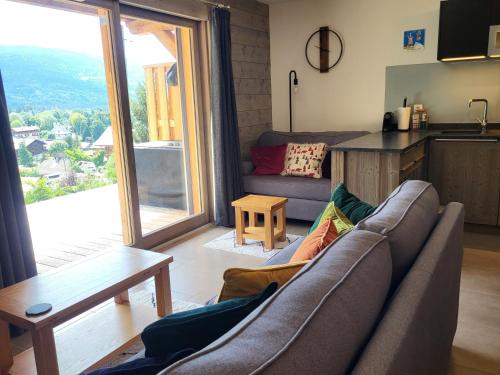 מטבח או מטבחון ב-Plein Soleil Modern 3 bedroom apartment with stunning mountain views