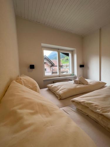 Liboria: lovely,cosy apartment. 2 min skilift walk房間的床