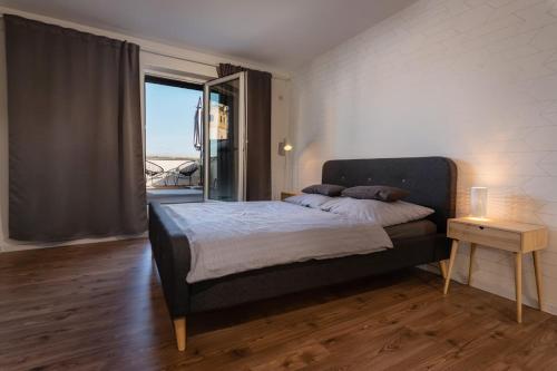 En eller flere senger på et rom på Apartmán pod Vežou 2