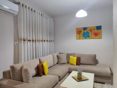 Кът за сядане в Tirana City Center Apartment