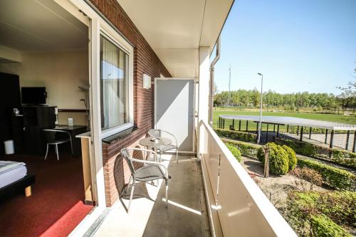 Un balcón o terraza en Hotel Frans op den Bult