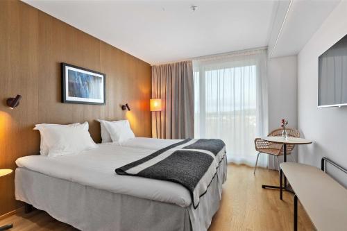 เตียงในห้องที่ Best Western Plus Ten Hotel