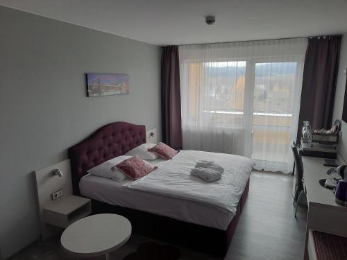 Vuode tai vuoteita majoituspaikassa Apartmány - Frymburk My Family