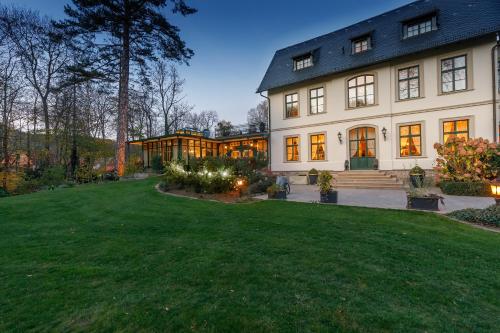 Vrt pred nastanitvijo Luxus Hotel Design Villa Ottilienruh Ilsenburg im Harz