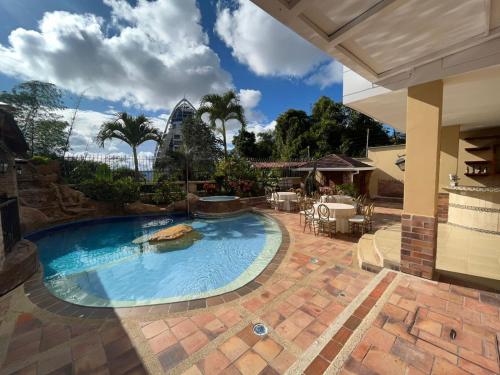 The swimming pool at or close to Serenity Suites Casa Boutique