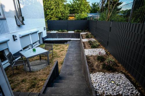 Taman di luar Exklusive Neubau Wohnung im Luftkurort Buchholz