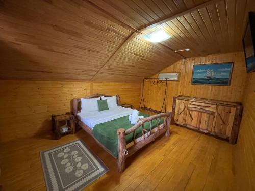 A bed or beds in a room at Sky Land Camping & Resort