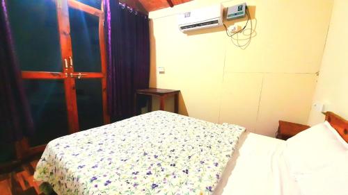 Cama ou camas em um quarto em CSF GARDEN HUTS