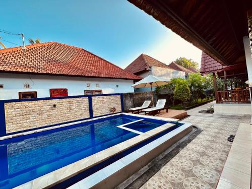 A piscina localizada em Kawi Penida Room ou nos arredores