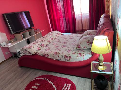 Lova arba lovos apgyvendinimo įstaigoje Apartament in centrul Bacau