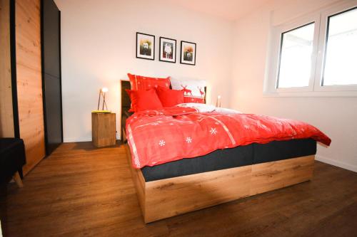 Una cama o camas en una habitación de BLACKFOXREST Ferienwohnung