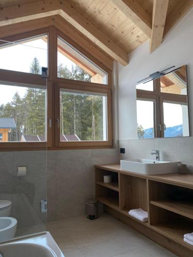 Kúpeľňa v ubytovaní Les Ciases Chalets Dolomites