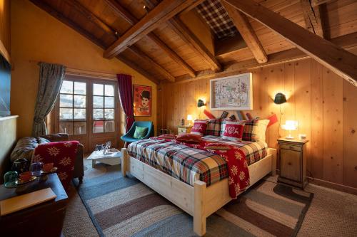 Tempat tidur dalam kamar di Magic Megève Bois