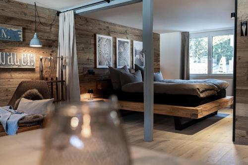 A bed or beds in a room at Loft am See