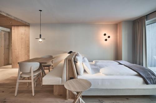 A bed or beds in a room at AMA Stay