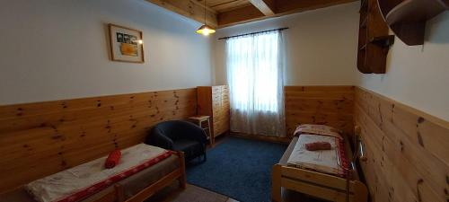 Cama ou camas em um quarto em Ferienwohnung für 5 Personen Rezidence KIENBERG Lipno nad Vltavou