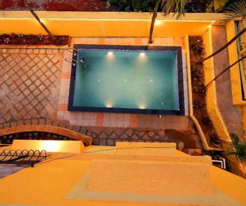 TV i/ili multimedijalni sistem u objektu Marigold Villa with Swimming pool