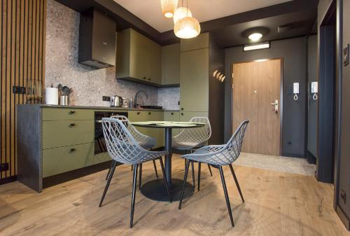 Dapur atau dapur kecil di Cudowny apartament blisko dworca