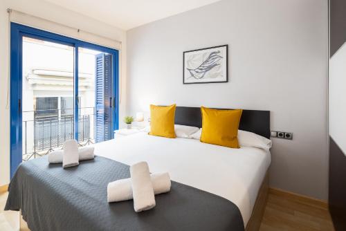 Ліжко або ліжка в номері Lucas House Apartments by Sitges Group