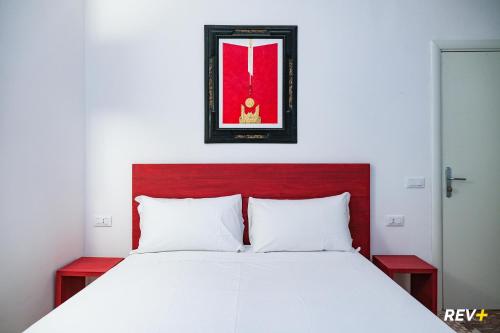 Cama ou camas em um quarto em Lia Art Hotel