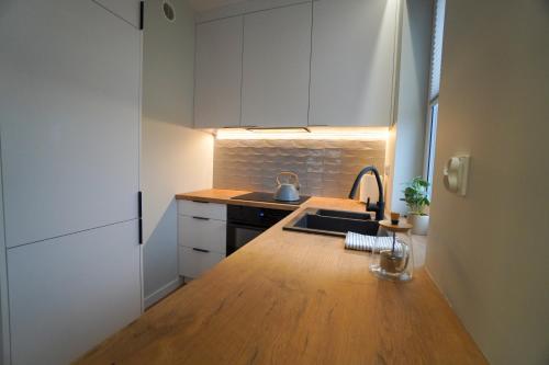 Majoituspaikan Apartament Manhattan keittiö tai keittotila