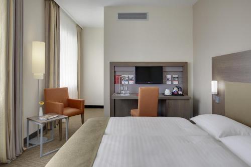 IntercityHotel Leipzig 객실 침대