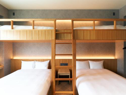 Ліжко або ліжка в номері Rakuten STAY naha-tomarifuto bunk bed room