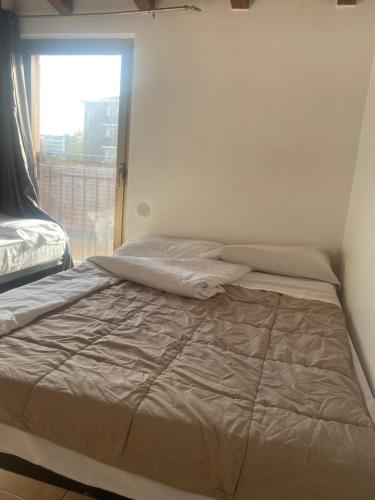 Krevet ili kreveti u jedinici u okviru objekta MRHostel Milano