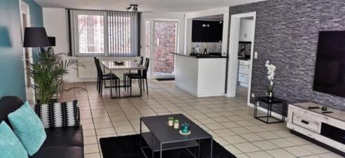 A kitchen or kitchenette at Résidence Gabrielle centre de Spa