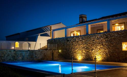 The swimming pool at or close to Herdade do Amarelo Nature & Spa