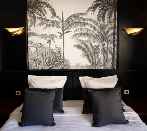 Tempat tidur dalam kamar di Hôtel Gallia Cannes