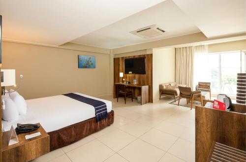 A bed or beds in a room at Casa Andina Select Pucallpa