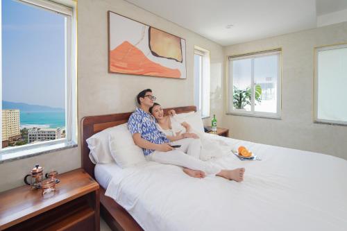 A bed or beds in a room at Hotel Soco