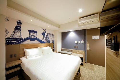 Una cama o camas en una habitación de Travelodge Sapporo Susukino