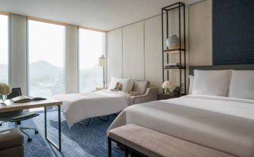 Krevet ili kreveti u jedinici u okviru objekta Four Seasons Hotel Seoul