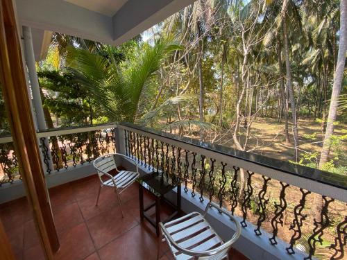 A balcony or terrace at Franria Villa Guest House