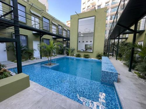 The swimming pool at or close to OASIS TROPICAL HOTEL