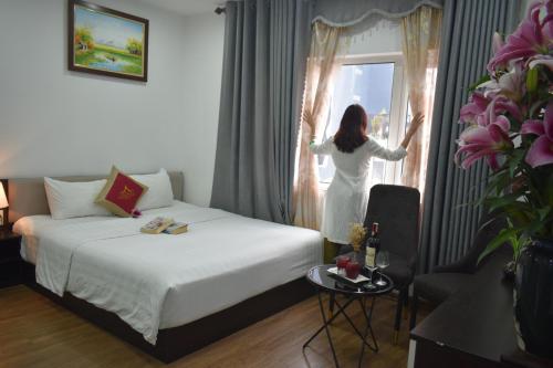 Krevet ili kreveti u jedinici u okviru objekta Hanoi Aria Central Hotel & Spa