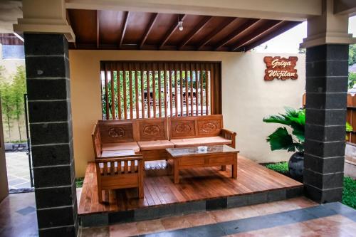 A seating area at Griya Wijilan Syariah