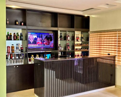 Khu vực lounge/bar tại Whitehouse Msquare Hotel