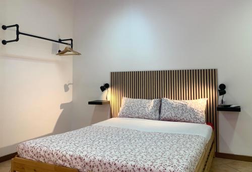 Una cama o camas en una habitación de Cascina Bellaria