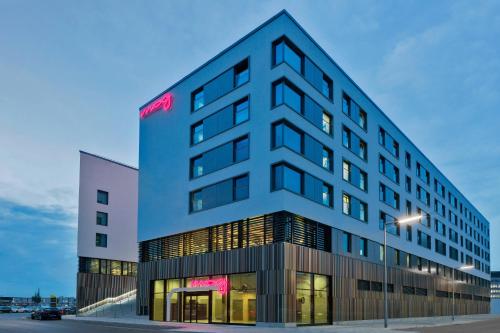 a building with a sign on the side of it at Moxy Munich Ostbahnhof in Munich