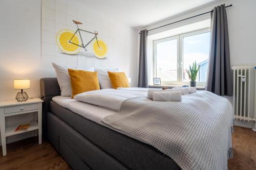 Kama o mga kama sa kuwarto sa dreamcation Apartments - Altstadt Kelheim