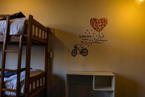 מיטה או מיטות בחדר ב-Lobo Hostel La Paz