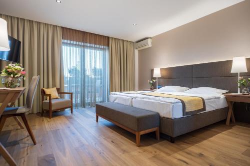 Giường trong phòng chung tại Hotel Turmhof