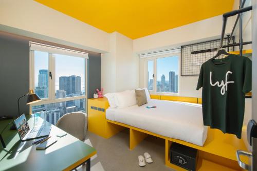 Katil atau katil-katil dalam bilik di lyf Malate Manila - Managed by The Ascott Limited