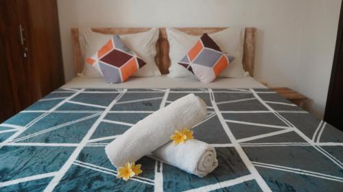 Katil atau katil-katil dalam bilik di Bali DD homestay seminyak