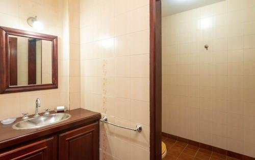 a bathroom with a sink and a mirror at Casa Salta in Salta